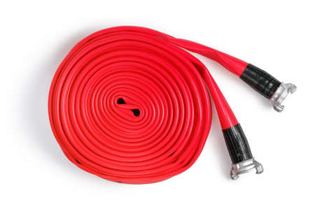 Red firefighter hose isolated on the white background. Flatlay, top viewの写真素材