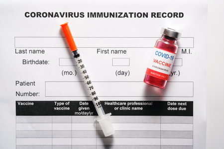 Glass vaccine vial and syringe for vaccination against COVID-19 SARS-CoV-2 coronavirus pandemic...
