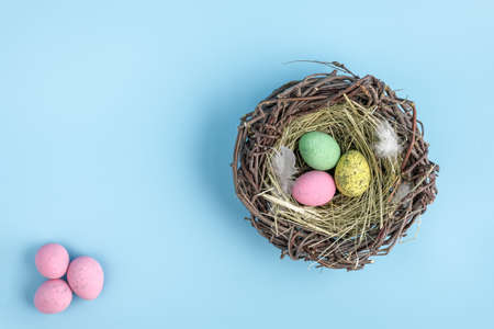 Top view of easter egg nest flat lay. Minimal holiday season concept background. Copy space for textの写真素材