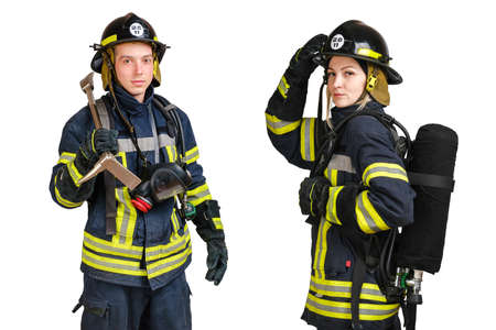 Young caucasian man and woman in uniform of fireman posing in profile with Air Cylinder Assembly on her back isolated on white background.の写真素材