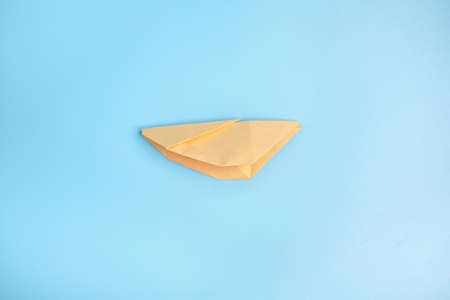 Origami Bunny. Step-by-step photo instruction on a blue background. Easter bunny. DIY concept Step12. Rabbit 2023の写真素材