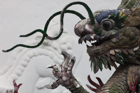 Decorations with coloured dragons in Chinese temple, Hoi An