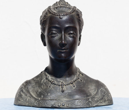 Old bronze statue of woman, Italyの写真素材