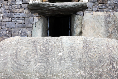 Newgrange is a Stone Age monument in the Boyne Valley, County Meath,  is best known for the illumination of its passage and chamber by the winter solstice sunの写真素材