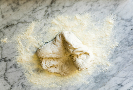 preparing pizza  at home. part two. Dough on the tableの写真素材