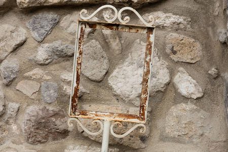 Metallic frame on green texture or background.の写真素材