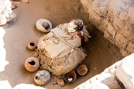 Bones in open inca cemetery in  Nazca region , Peru