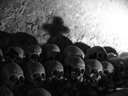 Skull and bones in ancient ossuary, Naples