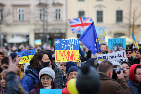 Krakow, Poland: February 27 2022: Protest to support Ukraine invided by Russia, crowd of people with...