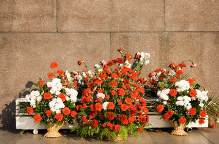 Marble monument with fresh flowers