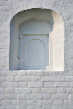 White wall with cloused window.の写真素材