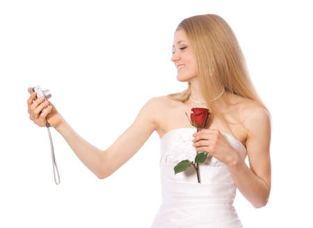 Young happy bride make self-portrait by portable cameraの写真素材