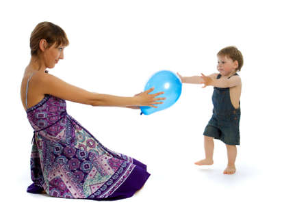 Young caucasian woman playing with boyの写真素材