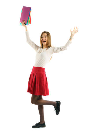 Cute young student girl with folders raise hands upの写真素材