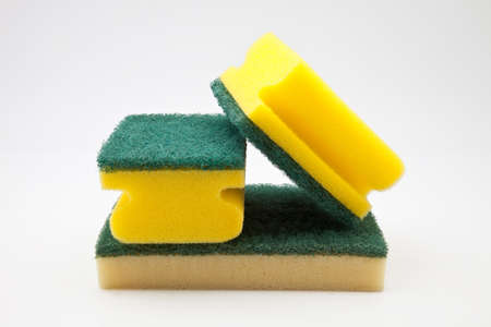 sponge scouring for cleaning crockeryの写真素材