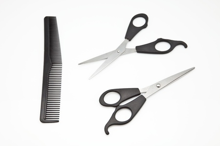 two scissors and comb hair careの写真素材