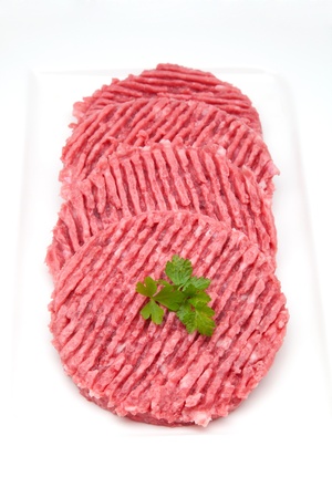 hamburger of raw meat ready to cook の写真素材