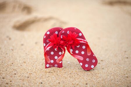 red sandals in the beachの写真素材