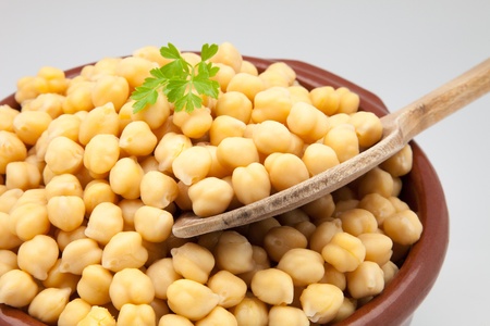 casserole of chick-peas cooked on white fundの写真素材