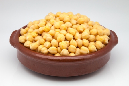 casserole of chick-peas cooked on white fundの写真素材