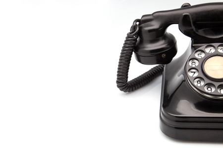 made obsolete bakelite phone on white fundの写真素材