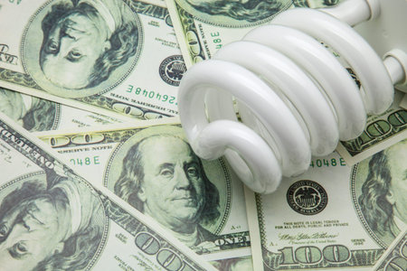 bulb of low consumption on tickets of dollar