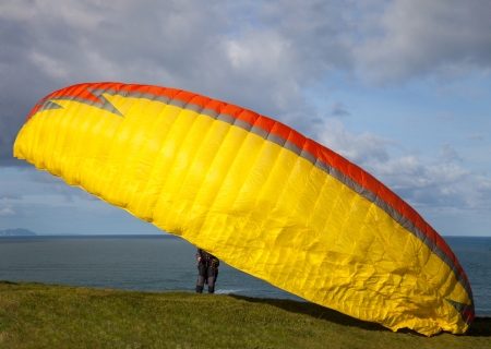 blast-off in the cliff of a paraglidingの写真素材