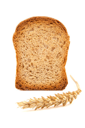 slice of toast and ear of wheatの写真素材