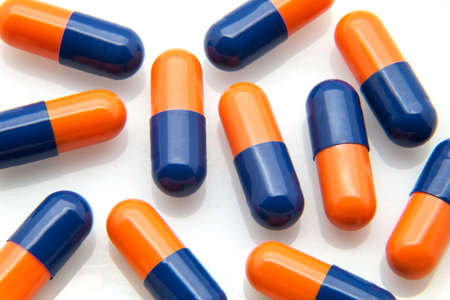 capsules and tablets on white fundの写真素材