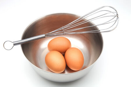 Eggs in bowl with whisk
の写真素材