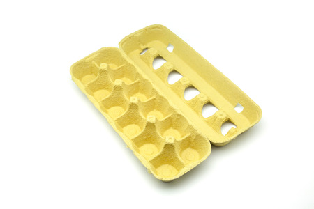 yellow and open eggs box emptyの写真素材
