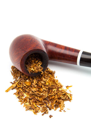 Tobacco-pipe with tobacco powder isolated over white backgroundの写真素材