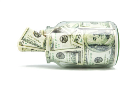 crystal pot with tickets for hundred dollarsの写真素材