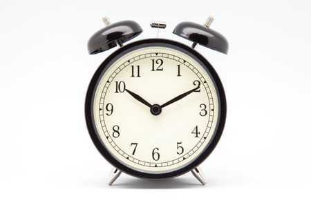 Classic alarm clock with white backgroundの写真素材