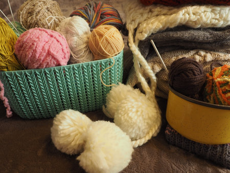 Yarn balls. Knitting as a kind of needlework. Knitted clothes