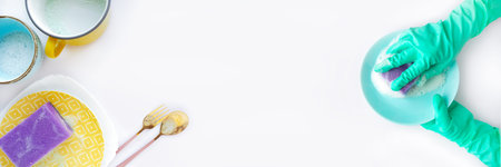 Banner: hands in mint blue rubber gloves with a purple sponge wash a blue plate and plates, mugs, a...