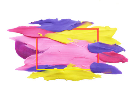 Background and texture stain of smeared yellow pink green purple and orange Plasticine. And a...
