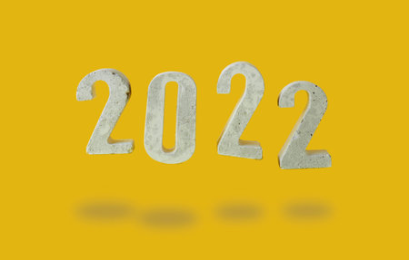 concept of levitation digits 2022 on yellow background.の写真素材