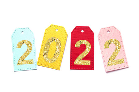 2022 inscription on multi-colored labels. isolate on a white background. concept new year 2022.