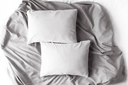 Two Blank White Pillows Grey linenの写真素材