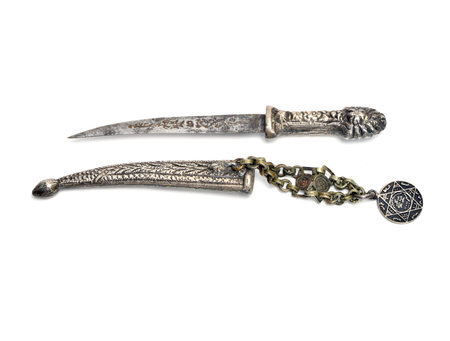 Isolated White Background Antique Dagger, Old dagger with a silver sheath to carry the weapon...