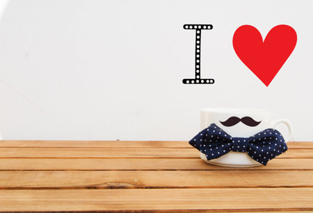 White mug on wooden background with mustaches and hand drawn lettering. Father's Day funny greeting card conceptの写真素材