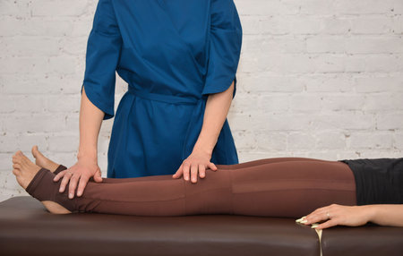 Medical treatment and medical service concept: doctor osteopath, neurologist or physiotherapist...