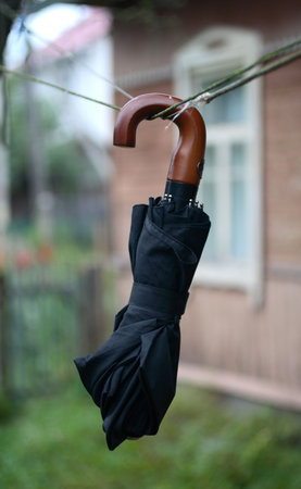 big close umbrella on the roupe with windowの写真素材