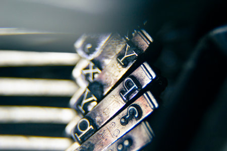 The iron hammers with the letters imprinted inside an old typewriter.Mechanical tools for writing Old time journalismの写真素材