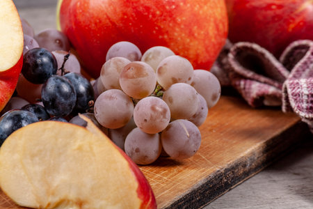 A lot of apples on a wooden tableの写真素材