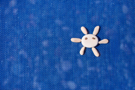 sun from stones on blue backgroundの写真素材