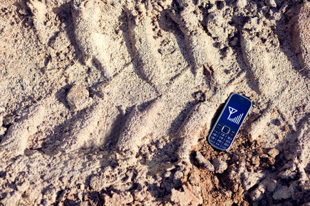 cell phone on treadの写真素材