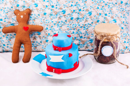 Christmas composition with cake, bear and jar with cookiesの写真素材