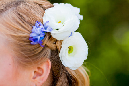 hairstyle girl with flowersの写真素材